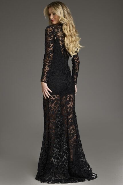 Back view of model wearing Jovani 39034 black gown with intricate lace.