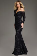 Model presenting Jovani 39266 black gown with elegant floral accents and long single sleeve.