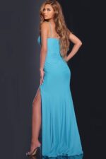 Back view of model in D5820 blue gown showcasing rear design